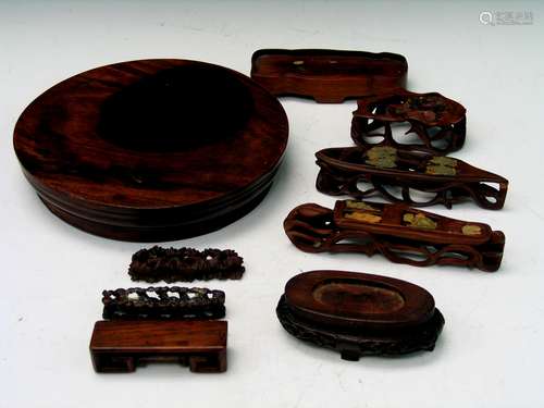 Group of Nine Huanghuali and Hard Wood Stands.