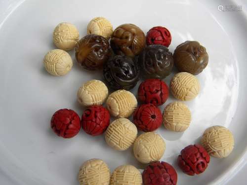 Group of Carved Chinese Cinnabar and Jade Beads, diamet