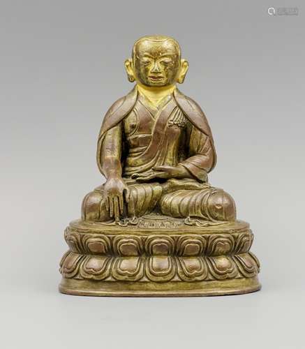 CHINESE GILT BRONZE FIGURE OF SEATED GURU