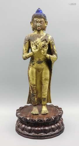 CHINESE GILT BRONZE STANDING FIGURE OF SHAKYAMUNI