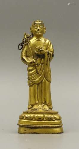 CHINESE GILT BRONZE FIGURE OF STANDING GURU