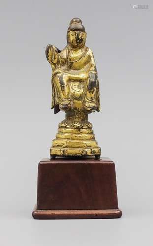 CHINESE GILT BRONZE DAOIST FIGURE ON STAND