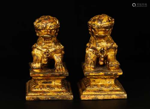 Pair of Chinese Gilt Bronze Lions