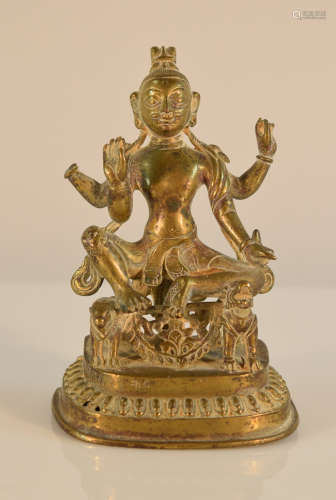 Nepalese Bronze Deity seated with Multi Hand