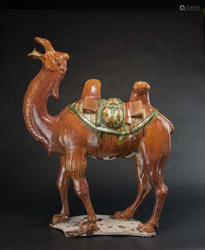 Tang Dynasty (618-907)-A Rare And Magnificent Large Sancai-Glazed
Pottery Figure Of Bactrian Camel