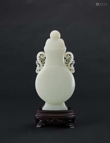 A White Jade Vase And Cover