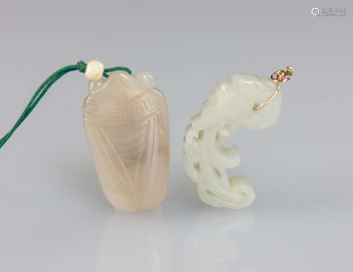 A Group Of Two White Jade Pendants