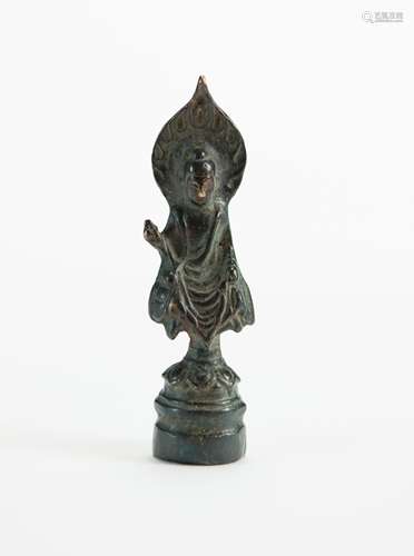 A Gilt-Bronze Figure Of Shakyamuni Buddha