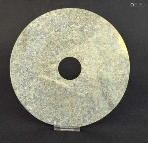 An Archaistic Mottled Jade Bi Disc