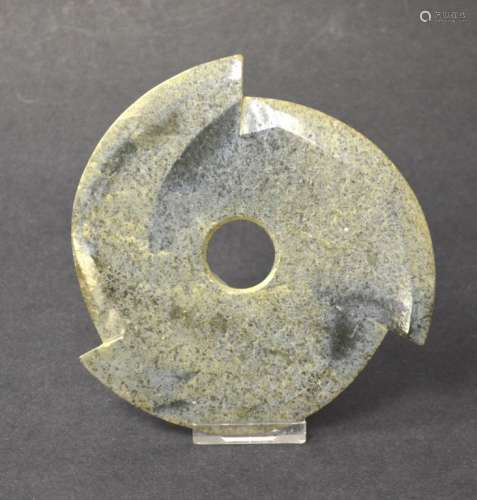 An Archaistic Wheel Form Jade Bi Disc