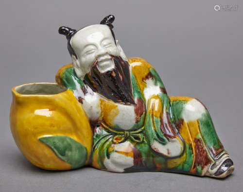 Chinese Sancai Glazed Porcelain Figure of a Sleeping Immortal Kangxi Period