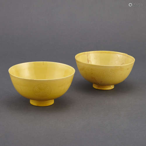 Two Similar Chinese Yellow Glazed Porcelain Bowls Kangxi Six-Character Mark and of the Period
