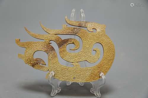 A Calcified Jade Carved 3-Tail Dragon