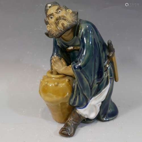 CHINESE SHIWAN POTTERY FIGURE OF A MAN