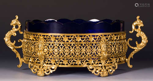 A GILT BRONZE WITH BLUE GLASS PLANTERS POT