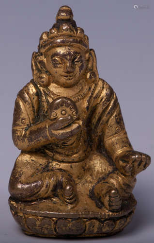 CHINESE GILT BRONZE FIGURE OF JAMBHALA