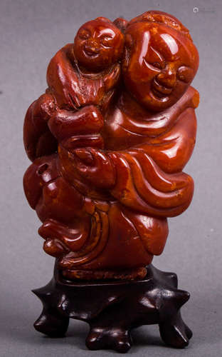 CHINESE MING DYNASTY HONEY AMBER CARVED MOTHER BOY