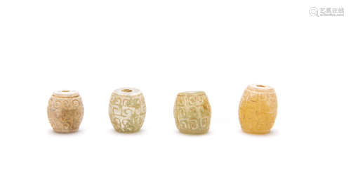 A Set Of Four Chinese Jade Beads