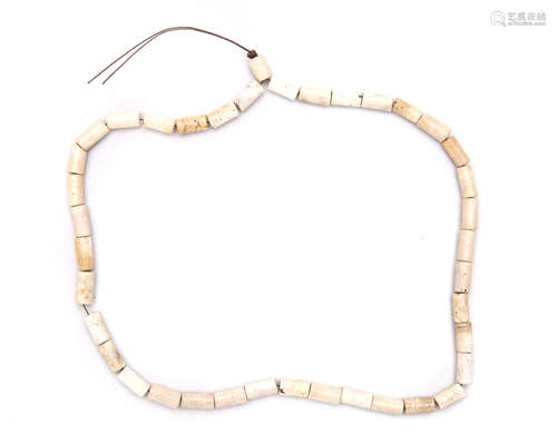 A Chinese White Jade Beads Strand