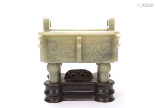 A Chinese White Jade Ding With The Stand