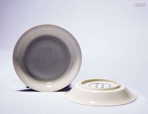 A Pair Of Chinese White Glazed Plates