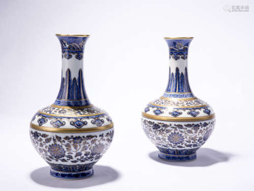 A Pair Of Chinese Gilded Blue And White Vases