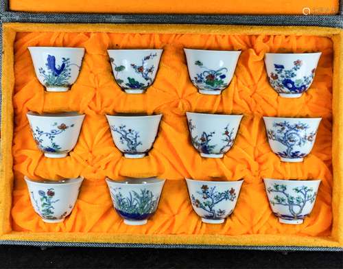 GROUP OF 12 QING DYNASTY FAMILLE ROSE CUPS