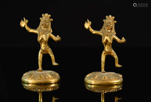 Pair of Tibetan Gilt Bronze Deity with Ax