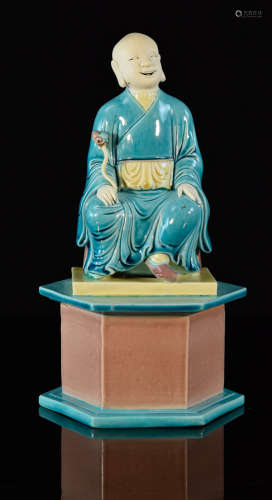 Chinese Porcelain Model of a Seated Lohan on Base