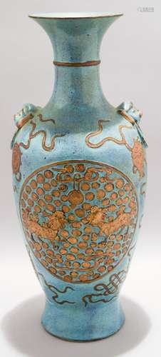 Stoneware vase. China. Late 19th century, Decoration of reserves of foo dogs and clouds with borders of the eight precious emblems with foo dog jump rings. Turquoise ground with gilt. Drilled through the mark on the base. 14-1/2