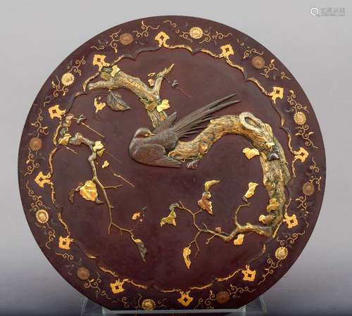 Iron plate with mixed metal inlay. Japan. Meiji period (1868-1912). Decoration of preening birds in a tree of gold, shakudo, copper and other alloys. Chrysanthemum borders. 14-1/2