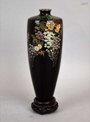 Cloisonné vase. Japan. Meiji period. (1868-1912). Silver wire decoration of wisteria and cherry blossoms on a midnight blue ground. Silver mounts. Signed Goto. 6-1/4