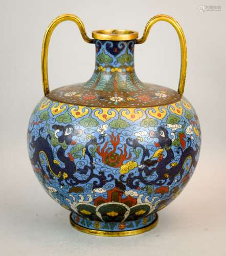 Cloisonné vase. China. 18th century or earlier. Bottle shaped with scroll decorated gilt handles. Decoration of dragons, pearls and clouds on a dark turquoise ground. 9-1/2