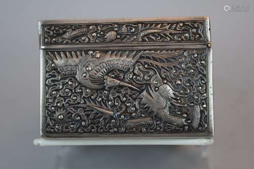 Chinese Export silver box. 19th century. Rectangular form. Repousse decoration of dragons, phoenixes and clouds. 5-3/4