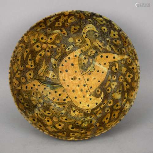 Pottery bowl. Persia. Ilkhanid period ware. Decoration of a crane and
flowers. 8