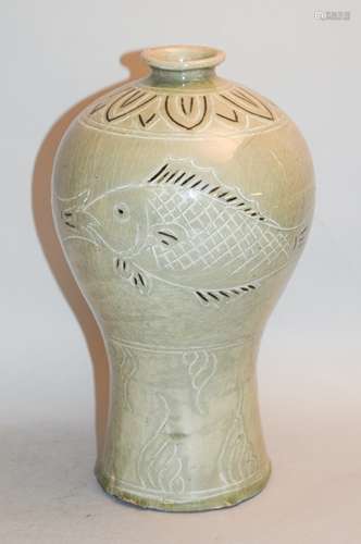 Wine bottle. Korea. Yi dynasty. 15th century Punchiong ware. Sagam inlay of fish. 11