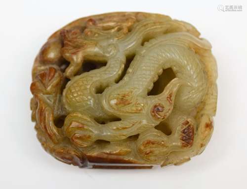 Jade carving. China. Yuan period. (1279-1368). Grey stone with russet marking. Finial carved with a dragon and cloud motif. 2-1/2