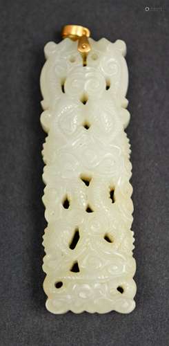 Jade carving. China. 19th century. White stone. Rectangular form carved and pierced with dragons and clouds. 2-1/2