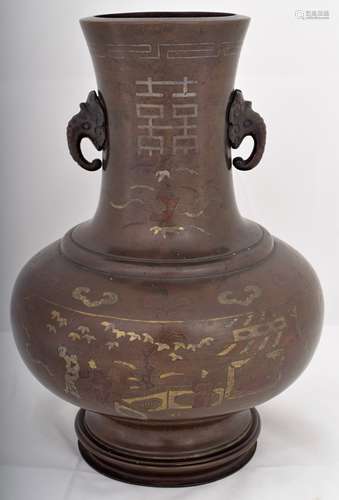 Bronze vase. China.  18th/19th century. Shih So style inlay of silver and copper with H si Shuang emblems, ju-I and historical scenes on a wan brocade ground. 11