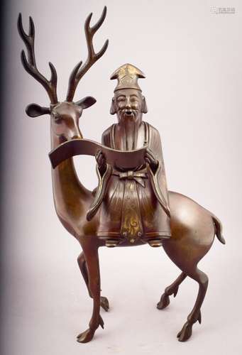 Bronze censer. 18th/19th century. Jurojin reading a scroll seated on the back of a deer. 21