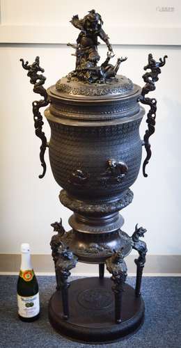 Large bronze censer. Japan. Meiji period. (1868-1912). Finial with a figure of Shoki the Demon Queller sculpted in the round. Dragon handles. Body decorated with hakan on a brocade ground. Base with chrysanthemum, crabs and water dragon feet. 45-1/2