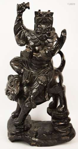 Hardwood carving. China. Late 19th century- early 20th century. Kuan Ti on the back of a tiger. 20