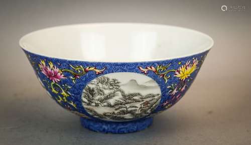 Pair of porcelain bowls. China. 20th century. Scraffeto blue ground with Famille Rose lotus scrolls around reserves of Sepia landscape roundels.