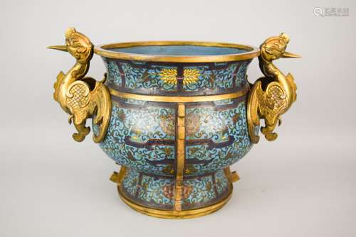 Cloisonné censer. China. Early 20th century. Gilt Phoenix handles. Decoration of lotus scrolls on a turquoise ground. Ch'ien Lung mark. 9-1/2