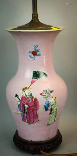 Porcelain vase. China. 19th century. Pink scraffito ground. Famille rose enameled relief decoration of the immortals. Drilled and mounted as a lamp. 12