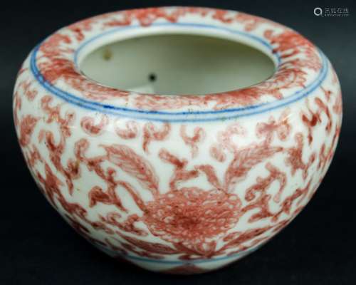 Porcelain water coupe. China. 19th century. Underglaze blue and red decoration of floral scrolling. Ch'ien Lung seal character mark on the base. 5-1/2