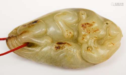 Jade carving. China. 18th century. Grey stone with russet marking. Carving of a phoenix and a tiger. 2-1/2