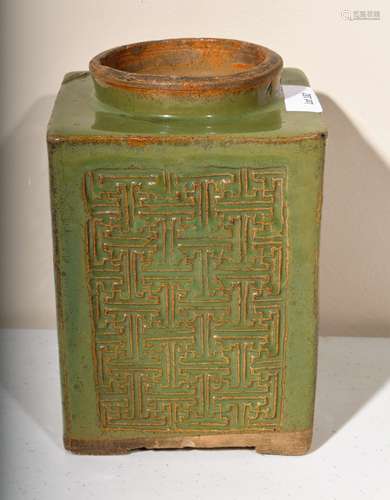 Stoneware jar. China. 19th century. Kuangtung ware. Square form with a Wan pattern surface. Celadon green glaze. 7-1/2