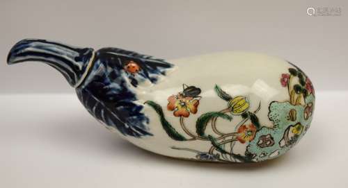 Porcelain bottle with stopper. China. 20th century. Eggplant shape. Underglaze blue and Famille Rose enamels. Surface decorated with flowers and insects. 5