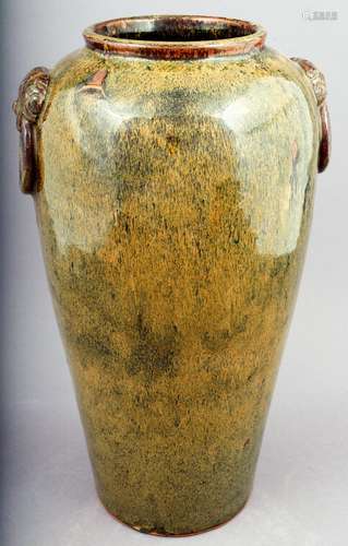 Stoneware vase. China. 18th/19th century. Kuangtung ware. Dragon mask handles. Tea dust glaze. 13-1/2